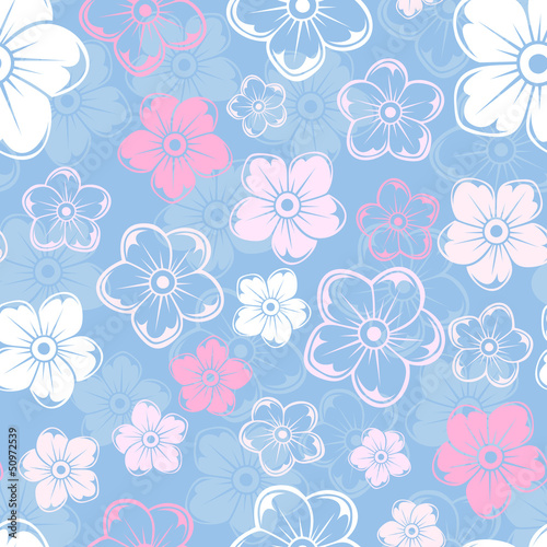 Vector seamless pattern with white and pink flowers on blue. © naddya