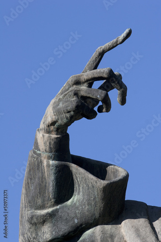 Hand from statue of Gregory of Nin in Split, town in Croatia photo