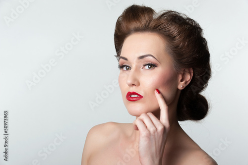 Beautiful vintage woman portrait with forties hairstyle