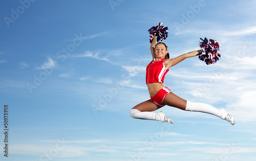 Young female cheerleader photo