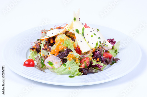 Salad with fresh vegetables and cheese.