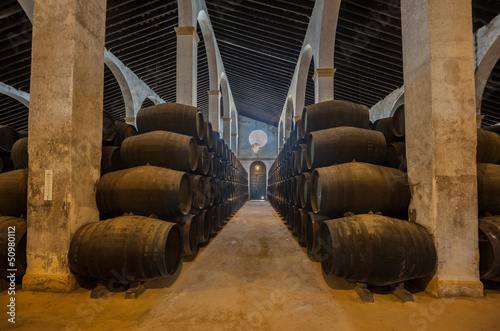 Sherry barrels in Jerez bodega, Spain photo