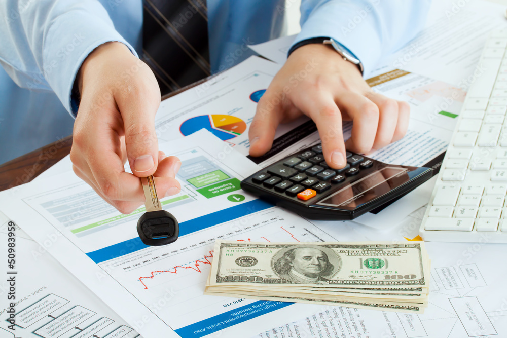 young business man giving key and account money young business man giving key and account money