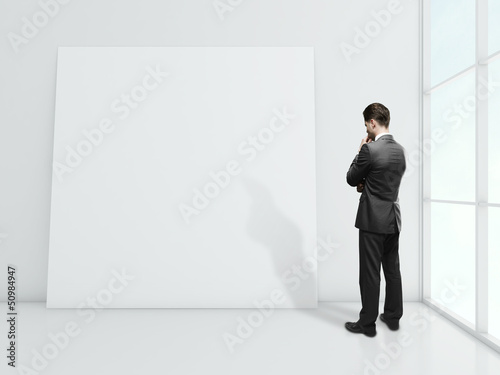 blank poster on wall © peshkova