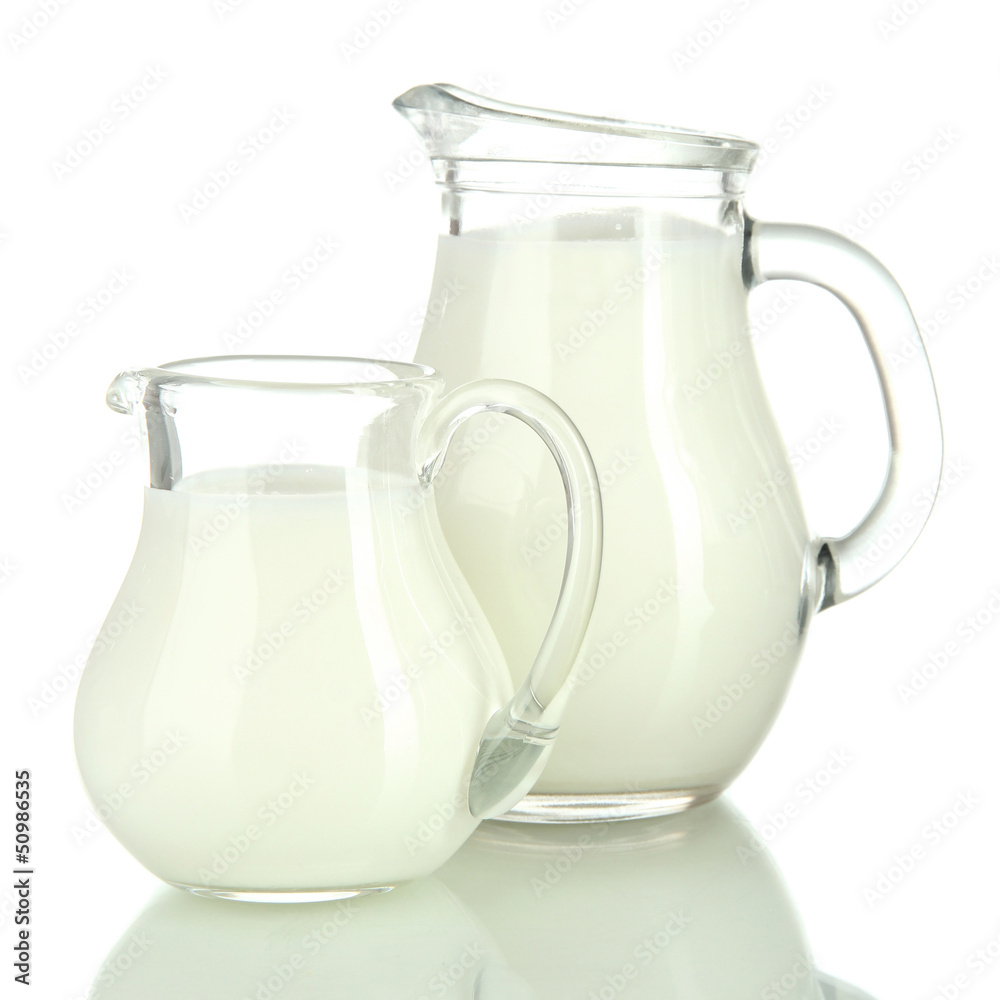 Two jugs of milk isolated on white Two jugs of milk isolated on white