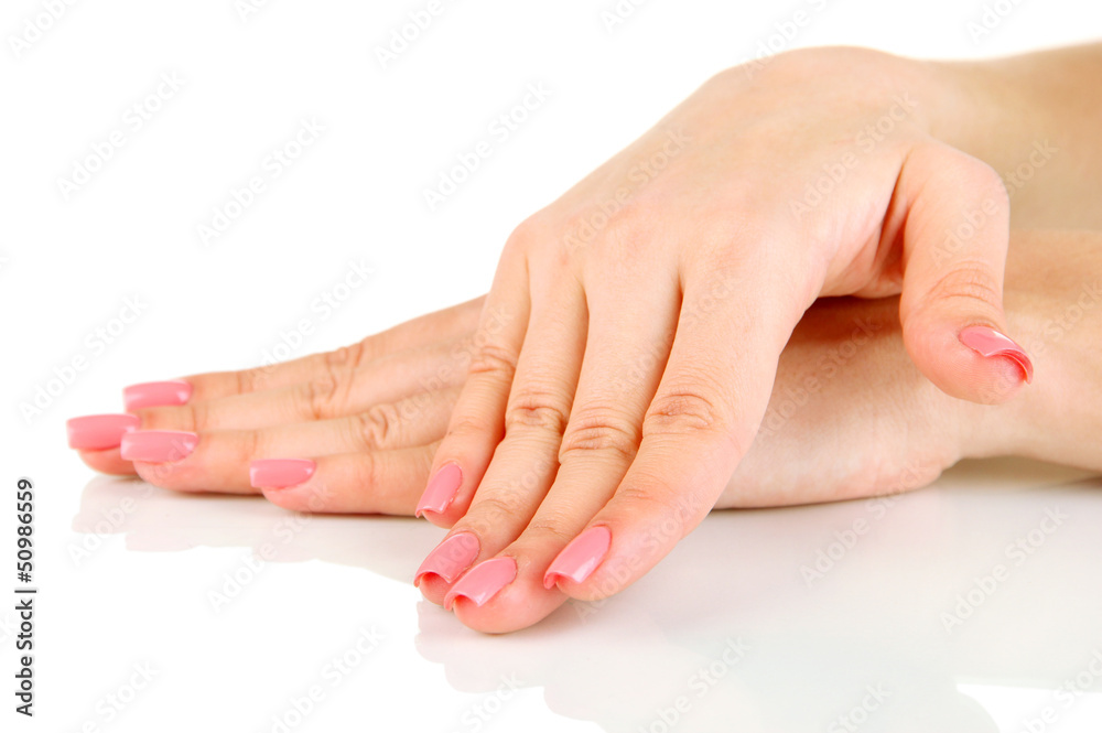 Fototapeta premium Beautiful woman hands with pink manicure, isolated on white