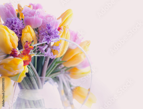 Fototapeta Naklejka Na Ścianę i Meble -  Greeting Card. Bouquet of Colorful Flowers Tulips in Vase