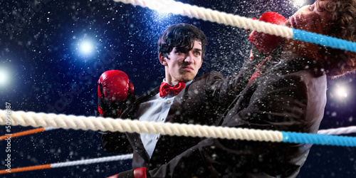 Two young businessman boxing © Sergey Nivens
