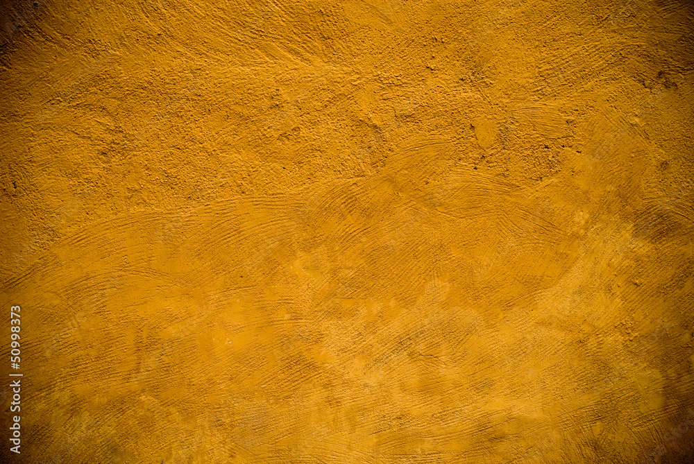 Fototapeta premium yellowish aged wall texture