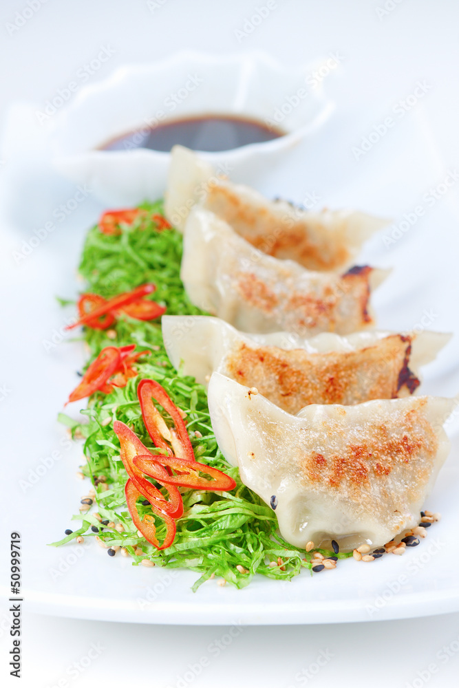 Ravioli dumplings and cabbage salad with sauce of wine. Ravioli dumplings and cabbage salad with sauce of wine.