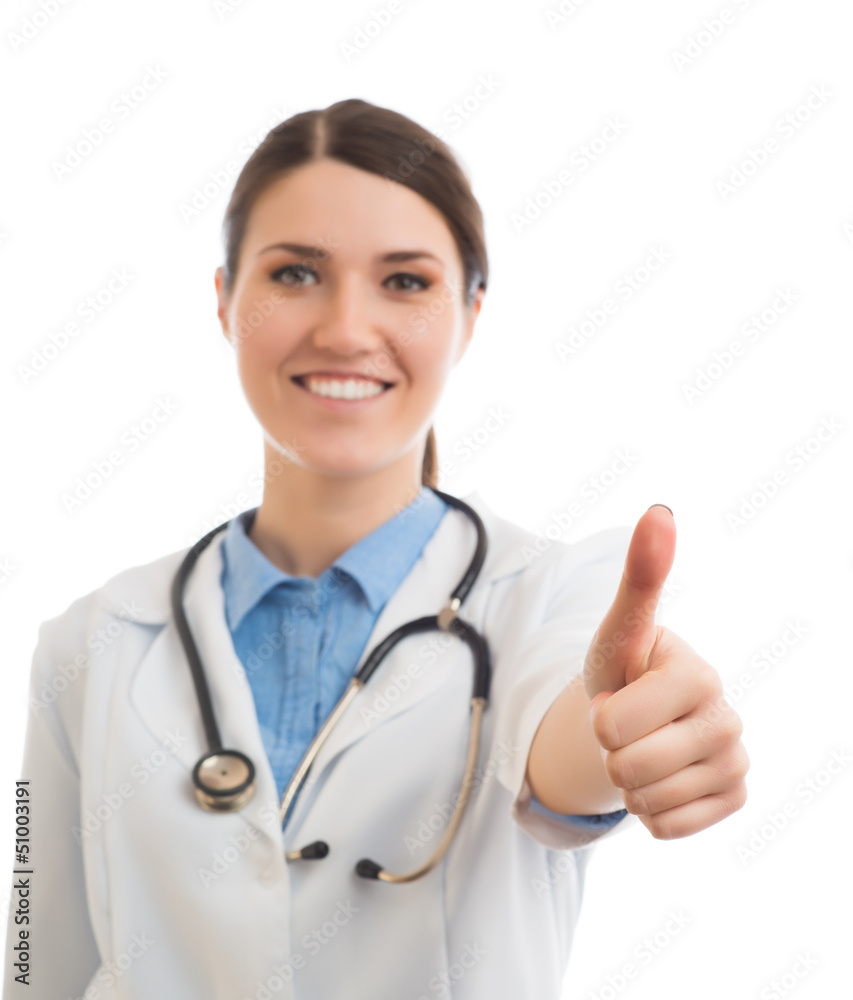 Female doctor with a clipboard gives the thumbs up Female doctor with a clipboard gives the thumbs up