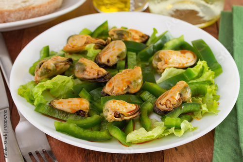 salad with mussels on the plate