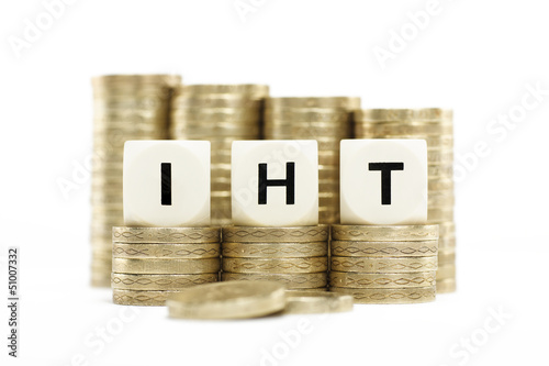 IHT (Inheritance Tax) on gold coins on white background