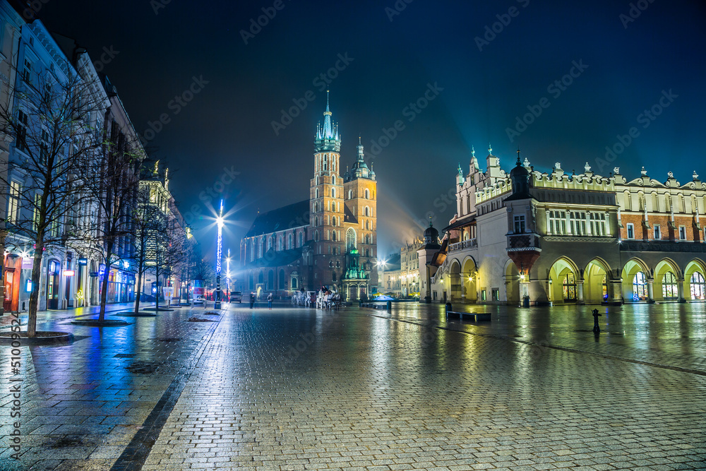 Naklejka premium Poland, Krakow. Market Square at night.