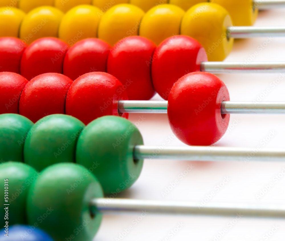 Close up of wooden abacus - selective focus Close up of wooden abacus - selective focus