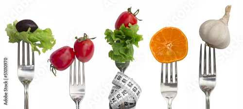 Diet concept, snack of vegetables and fruits on forks