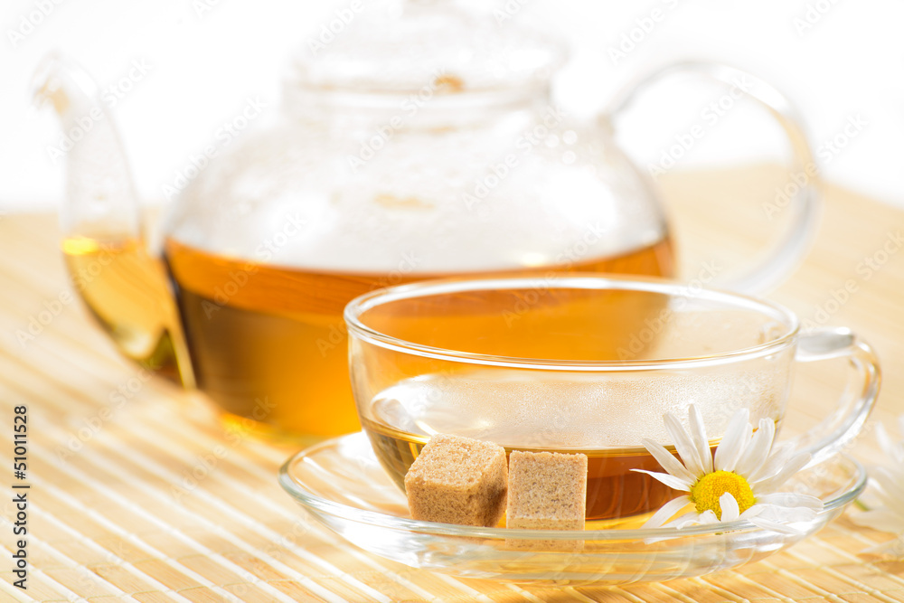 teacup with herbal chamomile tea teacup with herbal chamomile tea
