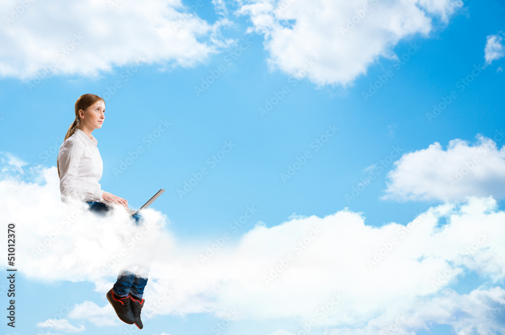 young girl running in the clouds with a laptop young girl running in the clouds with a laptop