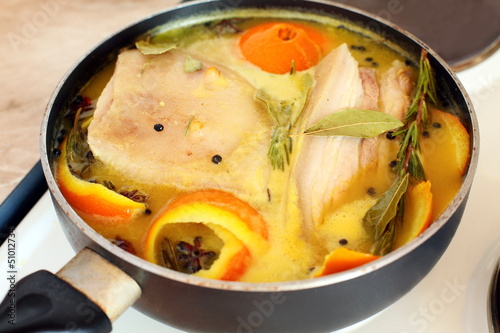 Pork loin in orange juice with spices.