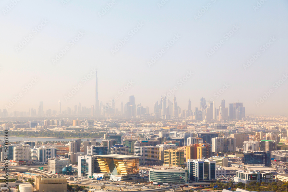 Dubai's skyscrapers and top view on a sunny day