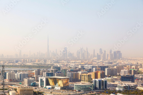 Dubai's skyscrapers and top view on a sunny day