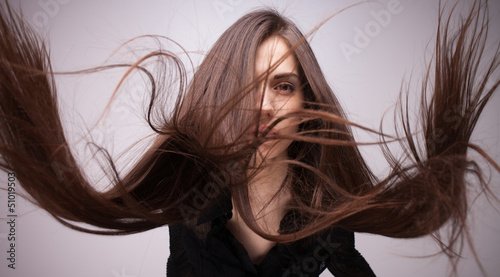 Portrait of girl with flying hair