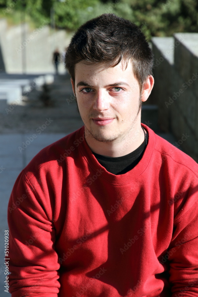 Portrait of a young man in red Portrait of a young man in red