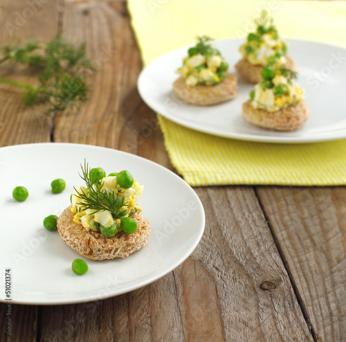 Canapes with green peas salad