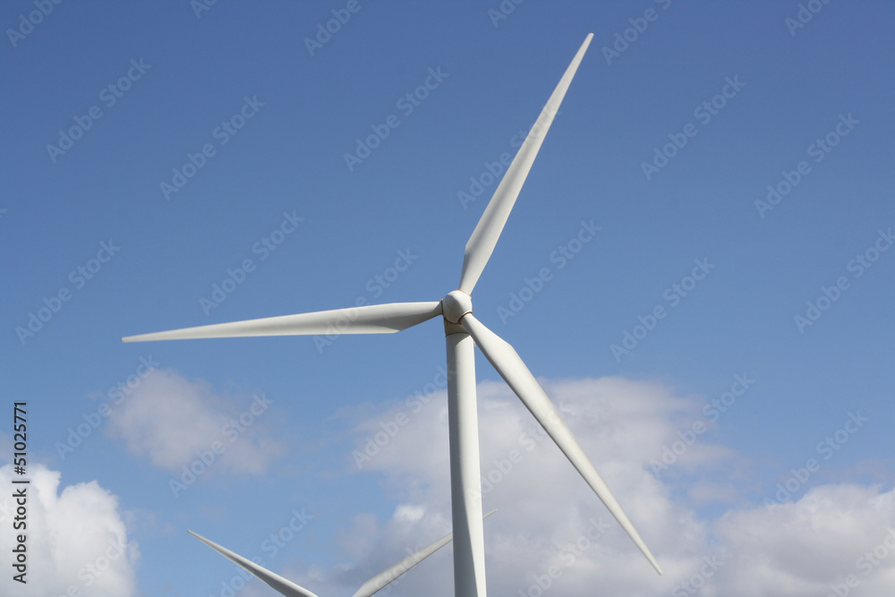 Wind Turbines against a blue sky (Lanzarote, Canary Islands) Wind Turbines against a blue sky (Lanzarote, Canary Islands)
