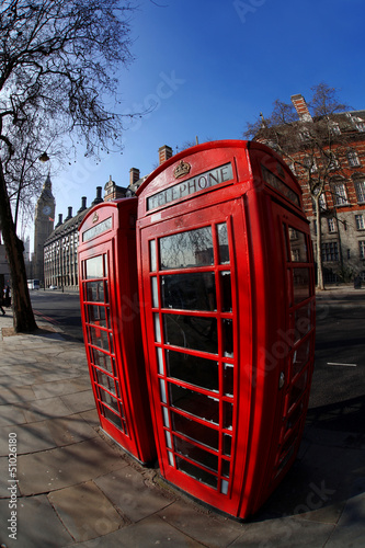 Old red phone boxes in London, England