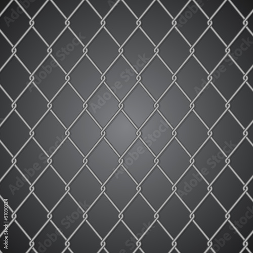 Metal fence on dark background