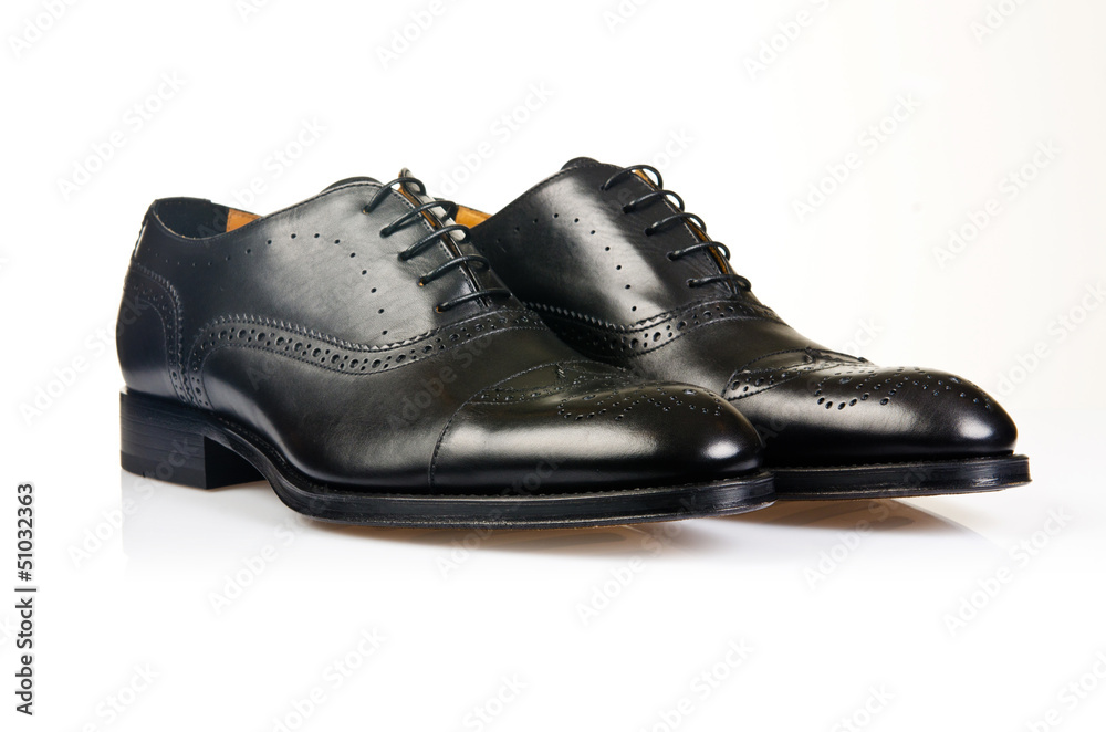 Fashion concept with male shoes on white Fashion concept with male shoes on white