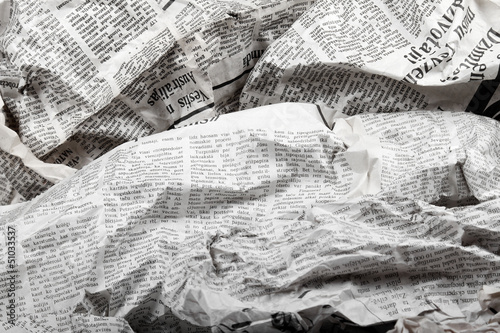 background of old crumpled newspapers