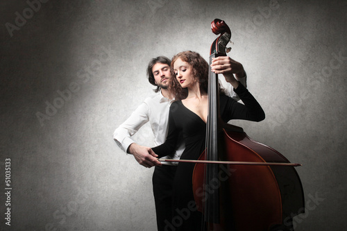 couple playing contrabass photo