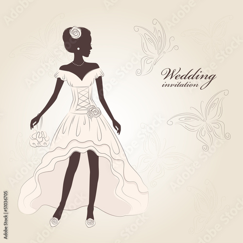Beautiful bride  in an elegant dress and stylish boots.