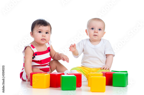 two babies or kids playing ...