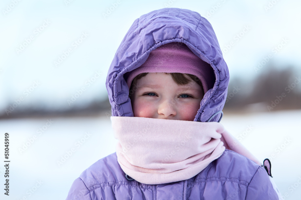 Portrait of wrapped in warm clothes small child in winter season Portrait of wrapped in warm clothes small child in winter season
