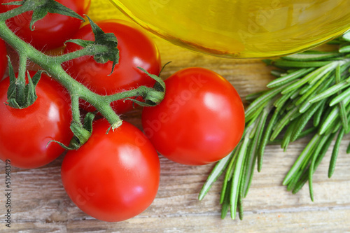 Cherry tomatoes, fresh rosemary and olive oil