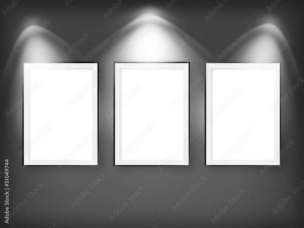 Three empty frames on a wall Three empty frames on a wall