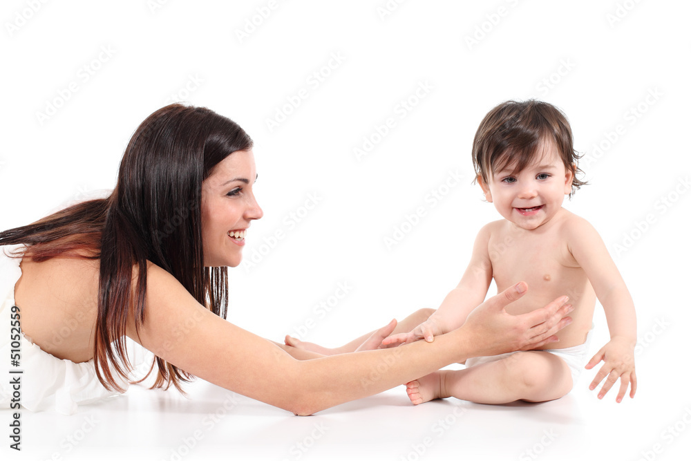 Beautiful mother playing with her baby and smiling Beautiful mother playing with her baby and smiling