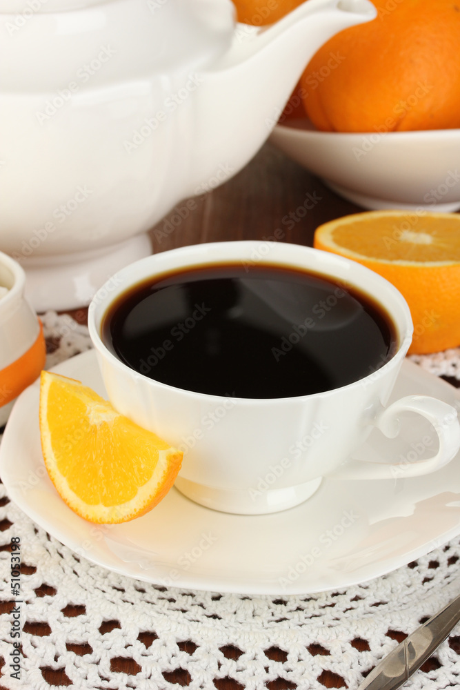 Beautiful white dinner service with oranges