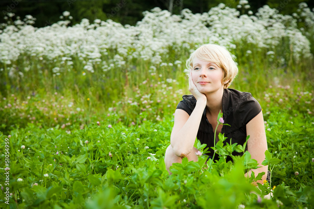 Pensive Girl in a field of flowers Pensive Girl in a field of flowers