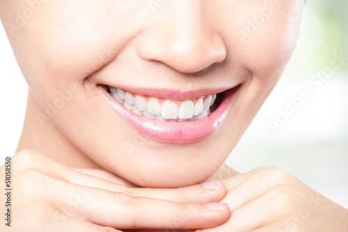 Beautiful young woman teeth close up