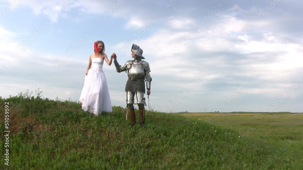 Knight and bride coming down the hill Knight and bride coming down the hill