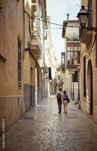 Loving couple walking down the street © Aliven