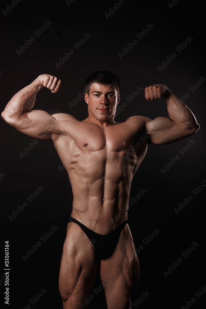 Poto of naked athlete with strong body