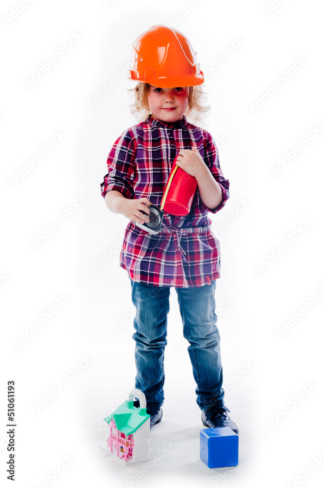 beautiful girl in a building helmet and tools in hand beautiful girl in a building helmet and tools in hand