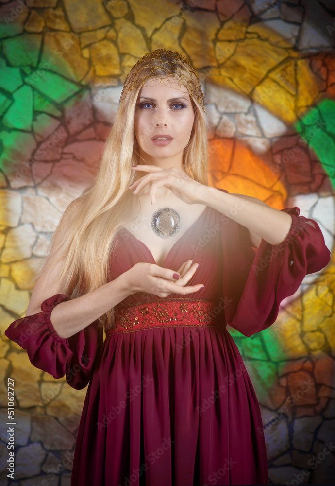 Obraz premium Woman in medieval dress with the 