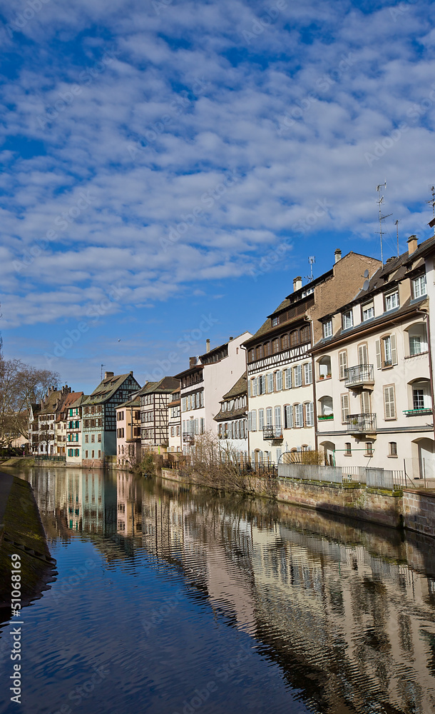 Historic houses on quay of Ill river. Strasbourg, France