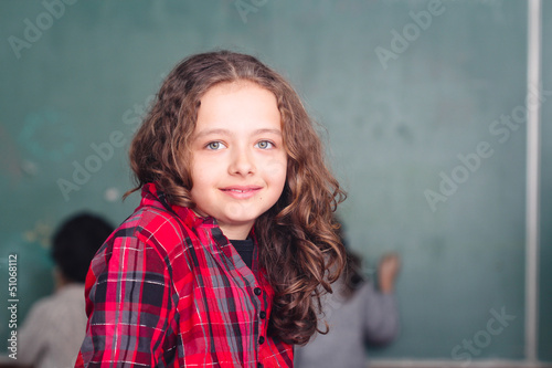 happy little schoolgirl portrait